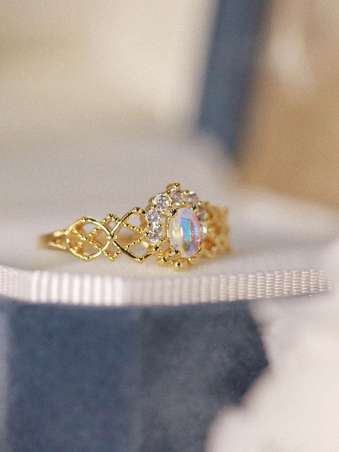 

StyleCast Gold-Plated Stone-Studded Round Shaped Adjustable Finger Ring