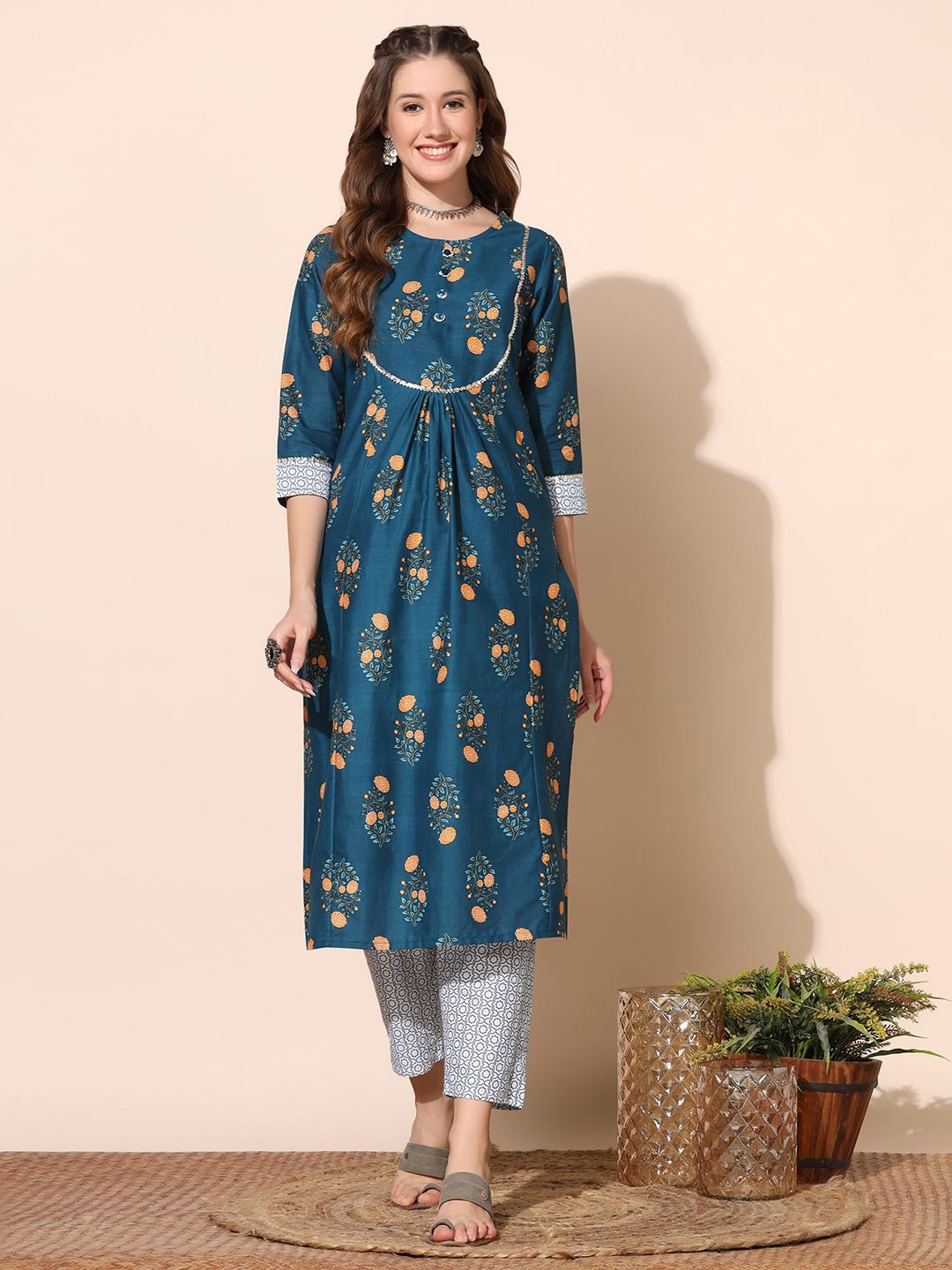 

Moda Rapido Floral Printed Round Neck Pleated Straight Kurta With Trouser, Blue