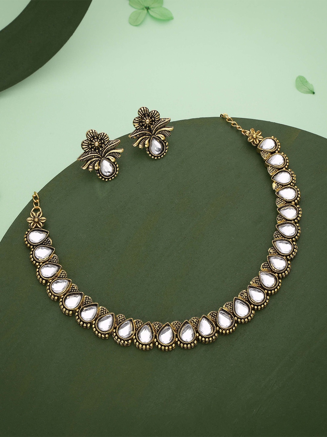 

Lyriss Gold-Plated Artificial Stones Studded Jewellery Set