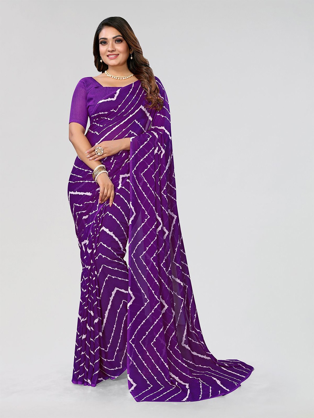 

Moda Rapido Geometric Printed Saree With Blouse Piece, Purple