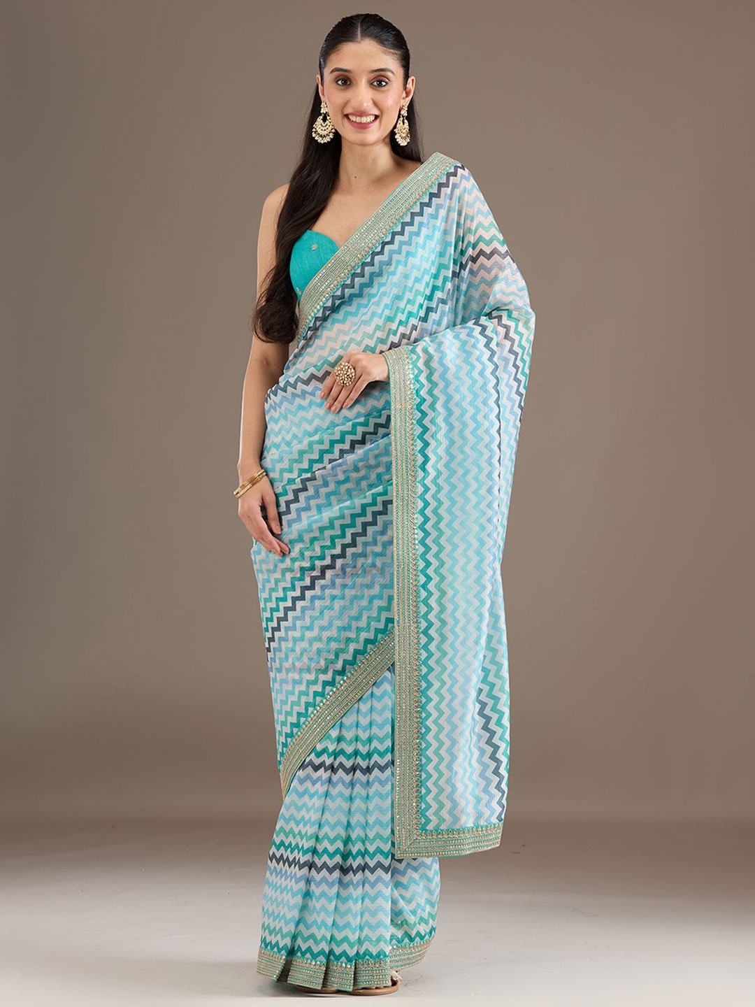 

Koskii Women Embellished Tissue Saree, Blue