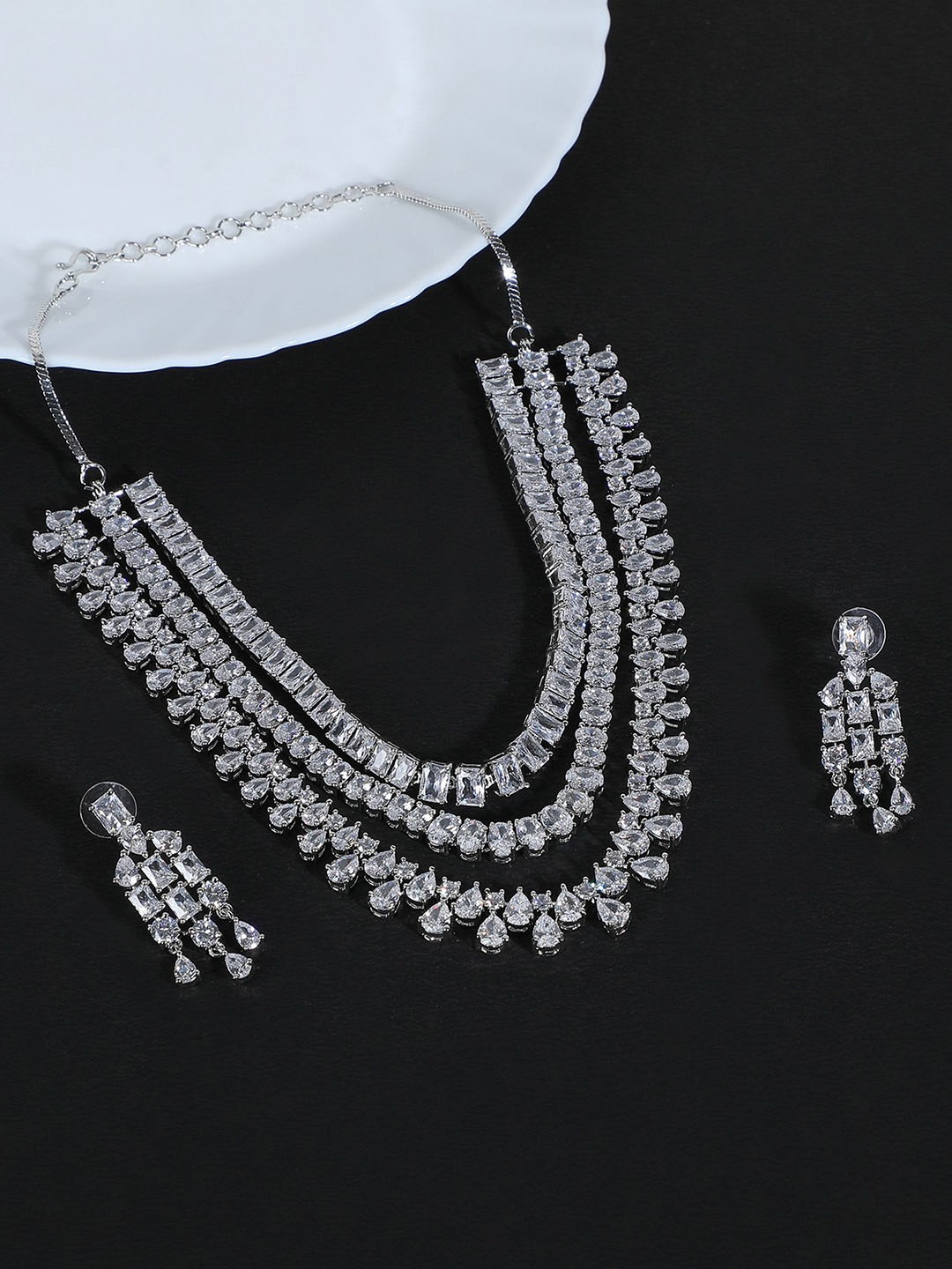 

AURAA TRENDS Silver-Plated American Diamond Studded Layered Jewellery Set