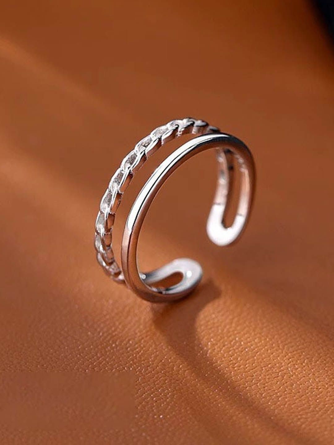 

StyleCast Silver-Plated Intricate Textured Round Shaped Adjustable Finger Ring