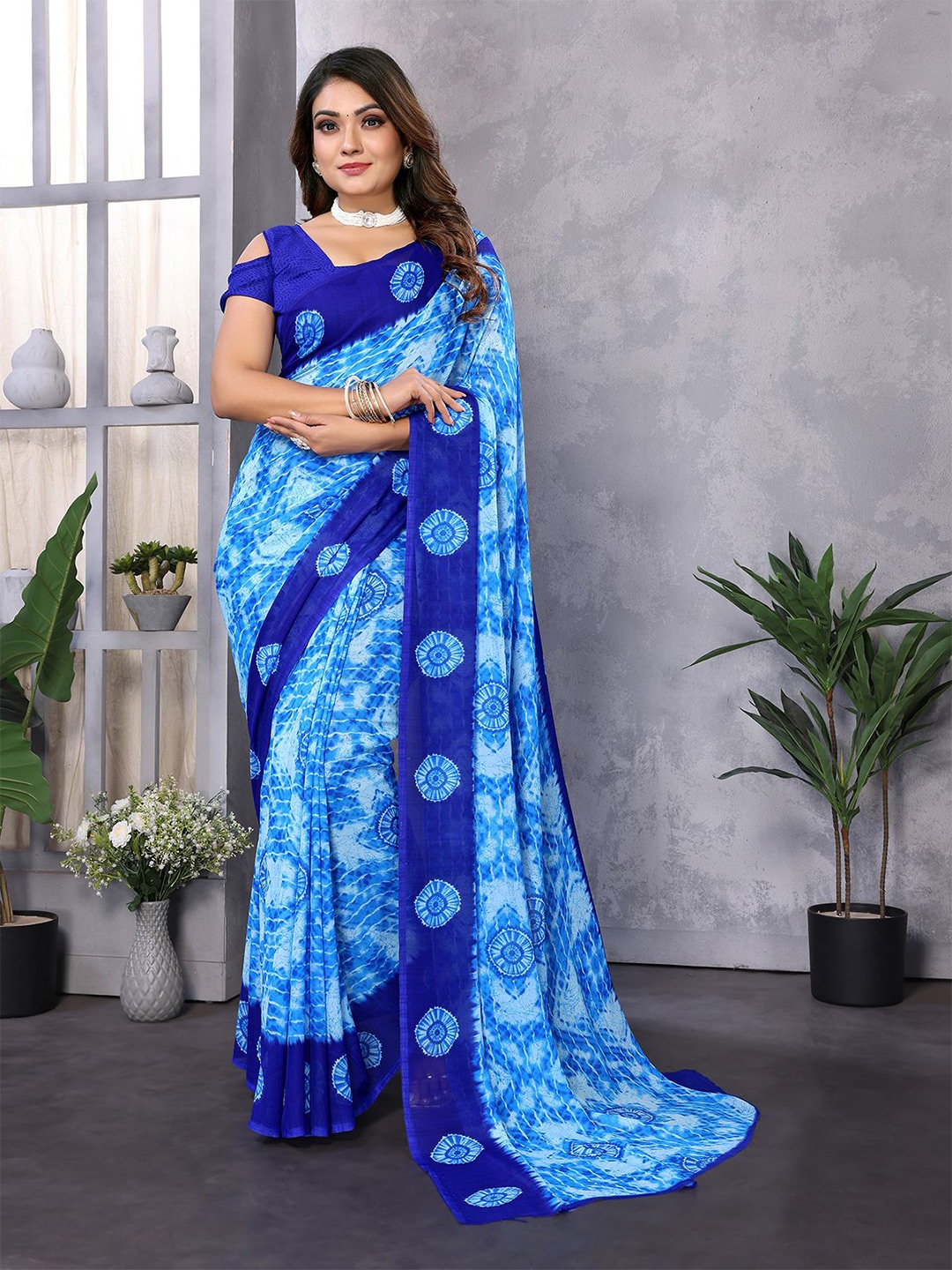 

Moda Rapido Abstract Printed Saree With Blouse Piece, Blue