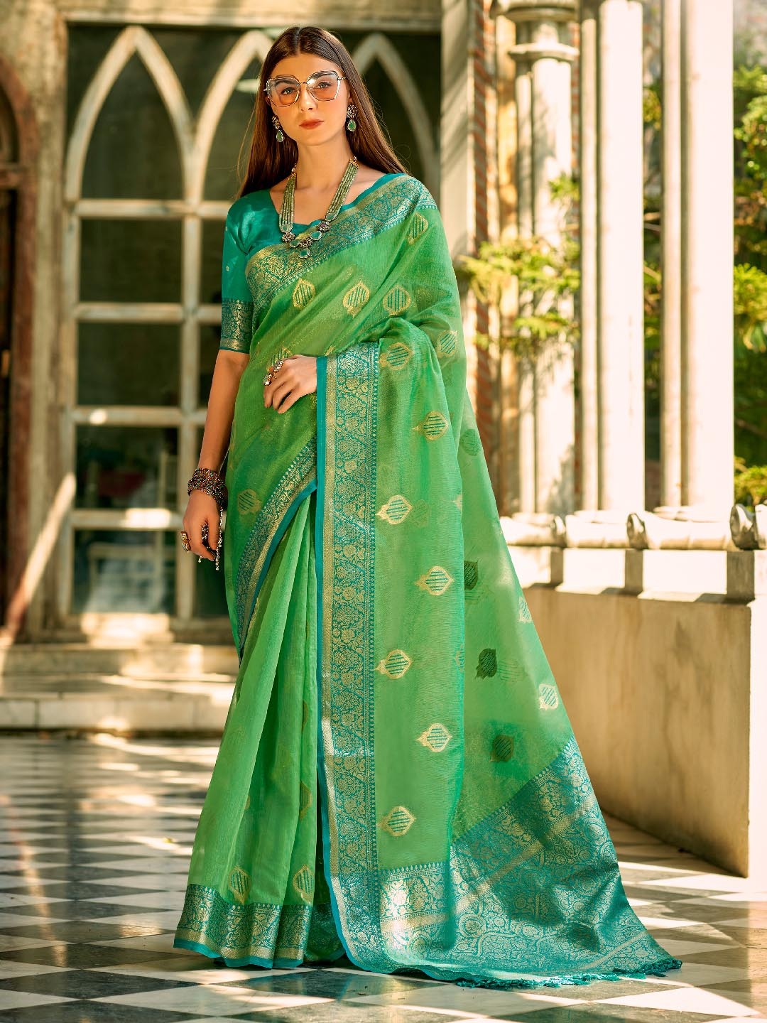 

Panzora Woven Design Zari Tissue Saree, Green