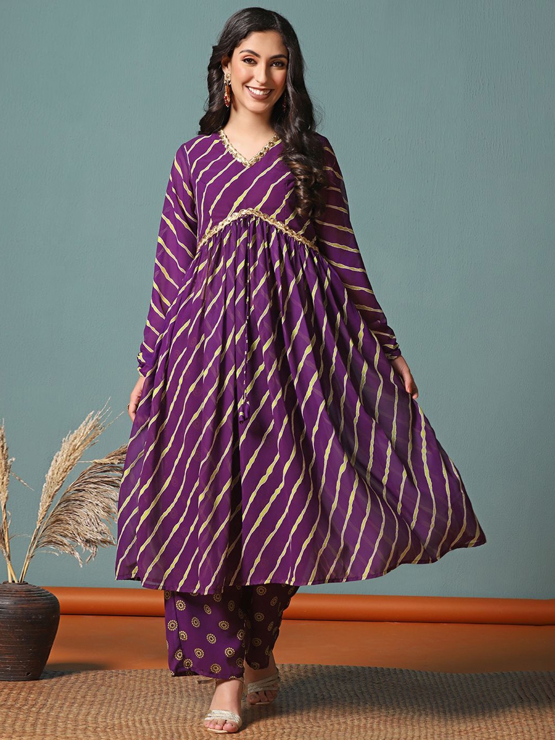 

Moda Rapido Leheriya Printed Empire V-Neck Georgette Anarkali Kurta With Palazoos, Purple