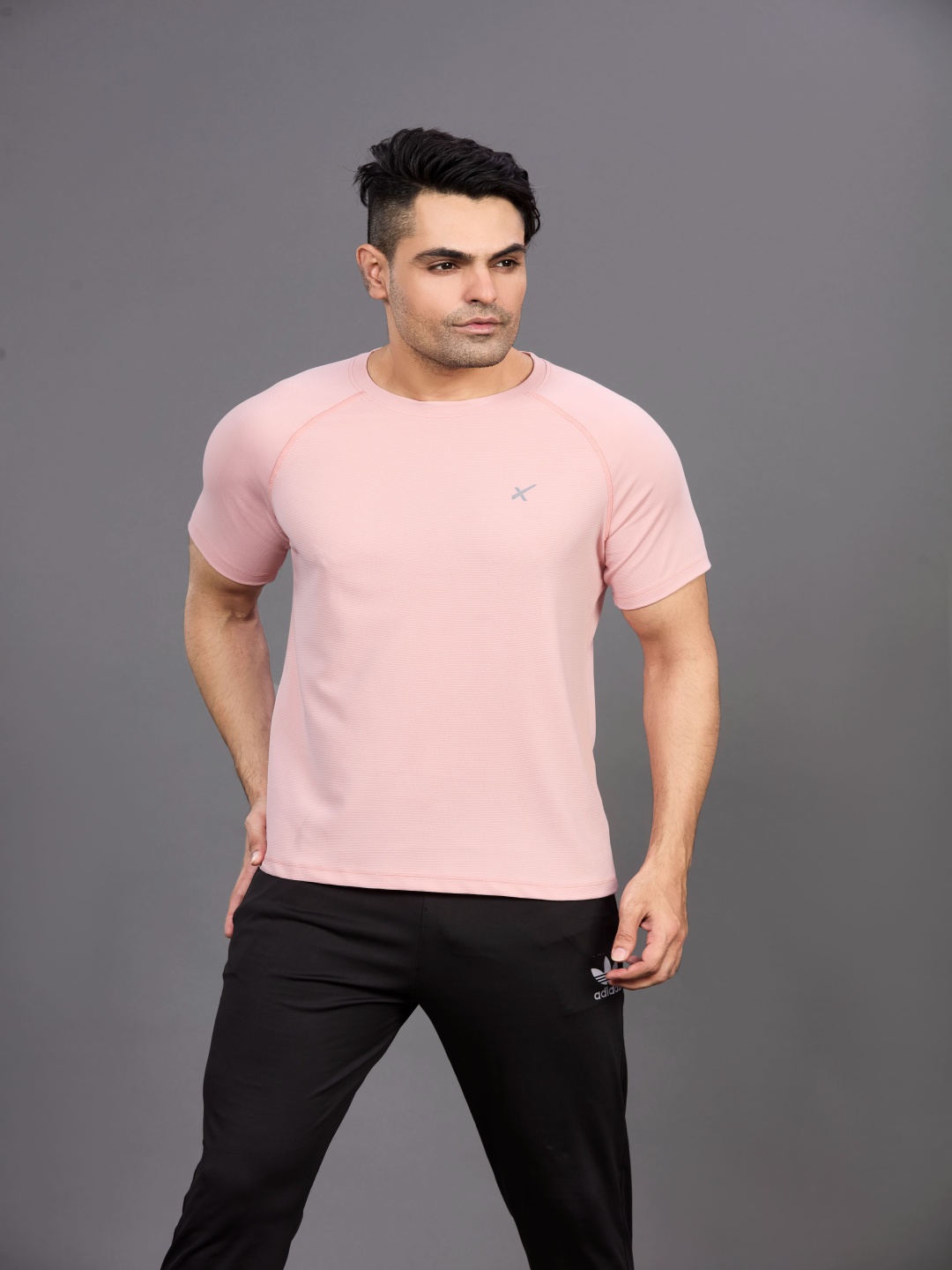 

HRX by Hrithik Roshan Men Solid Round Neck T-shirt, Peach