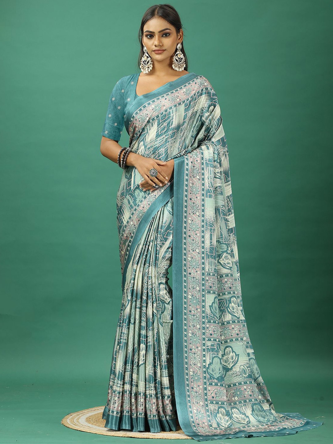 

A.V.M. SILK MILLS Ethnic Motifs Pure Crepe Saree, Turquoise blue