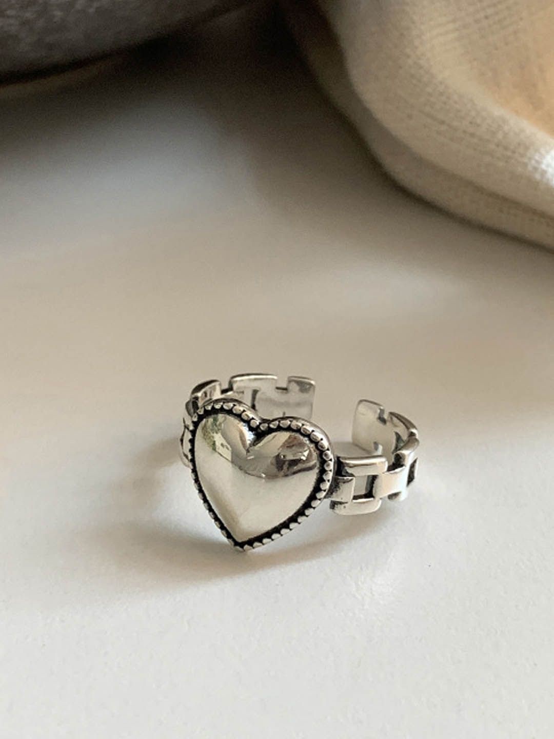 

StyleCast Silver-Toned Silver-Plated Heart Shaped Adjustable Finger Ring