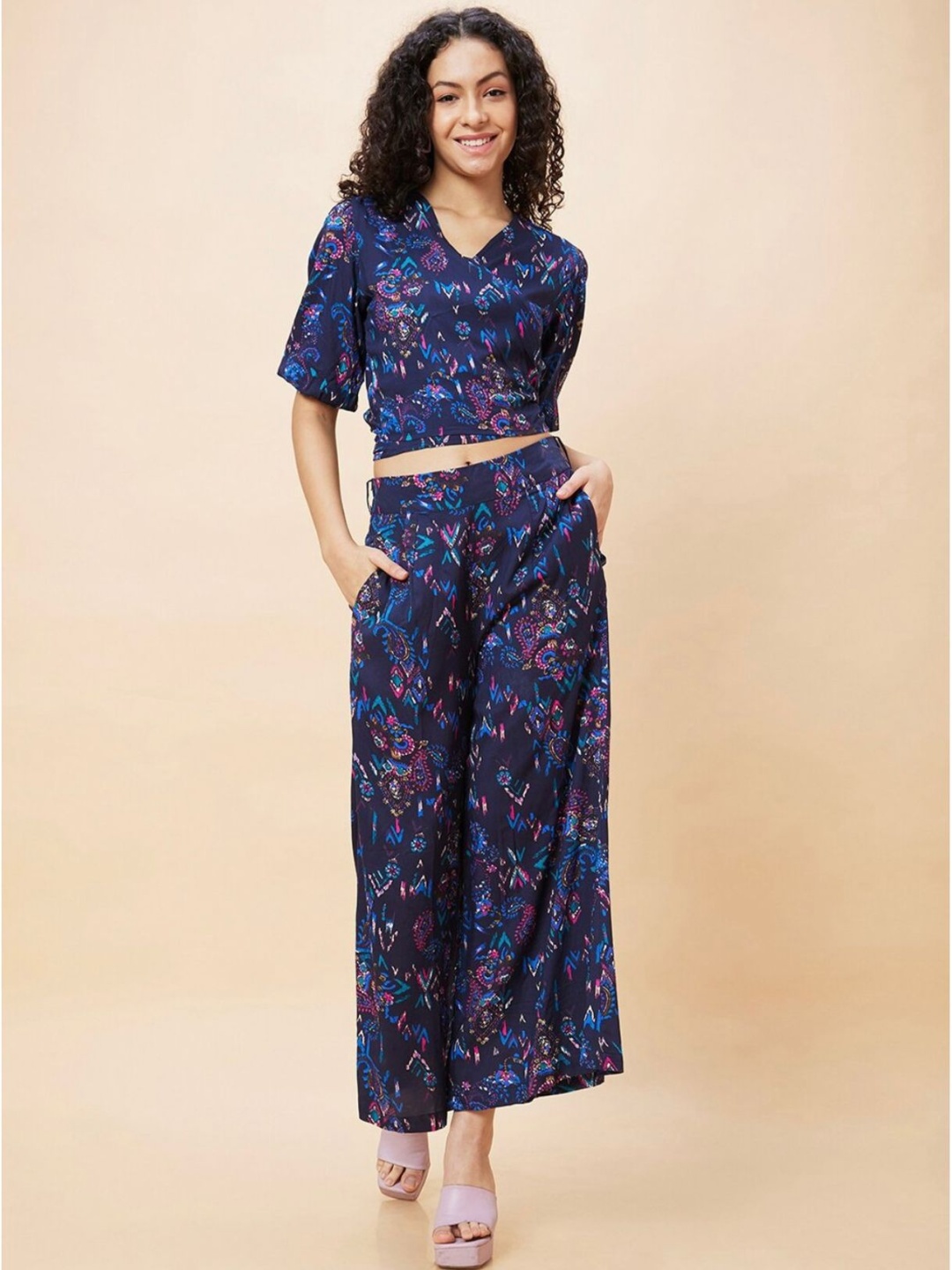 

CORSICA Ethnic Motifs Printed V Neck Wrap Tie-Back Crop Top With Flared Palazzos, Blue