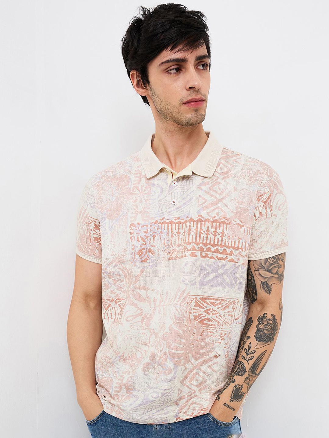 

SPYKAR Men Abstract Printed Polo Collar Cotton Slim Fit T-shirt, Peach