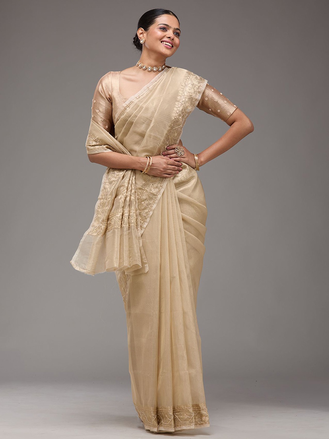 

Koskii Beads and Stones Beige Embellished Tissue Saree