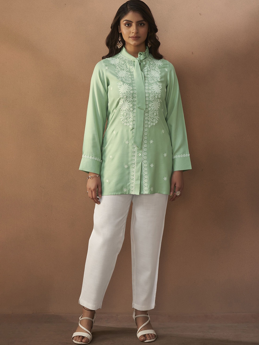 

Anouk Sea-Green & White Floral Embroidered Tie-Up Neck Straight Short Kurta