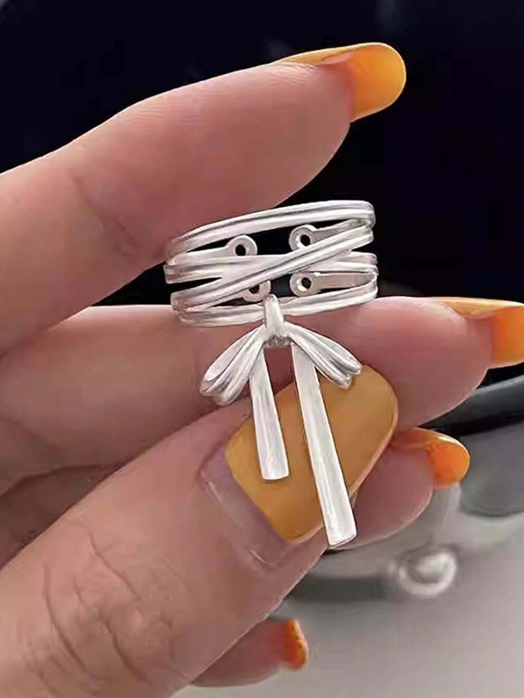 

StyleCast Elegant Silver-Toned Layered Bow Shaped Finger Ring