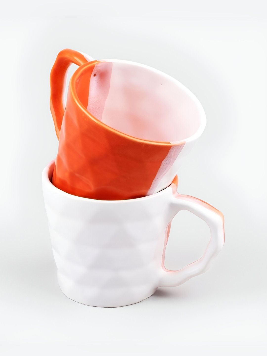 

Storepedia White & Orange Handcrafted Textured Ceramic Glossy Cups Set of Cups and Mugs