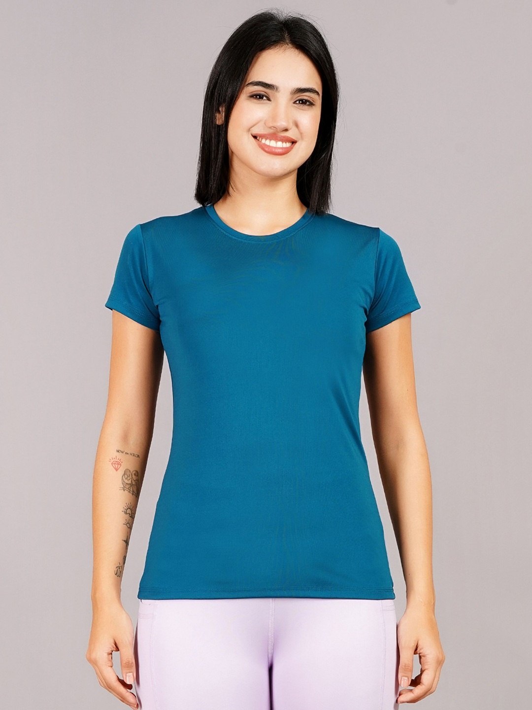 

Kyk Women Solid Round Neck Compression T-shirt, Teal