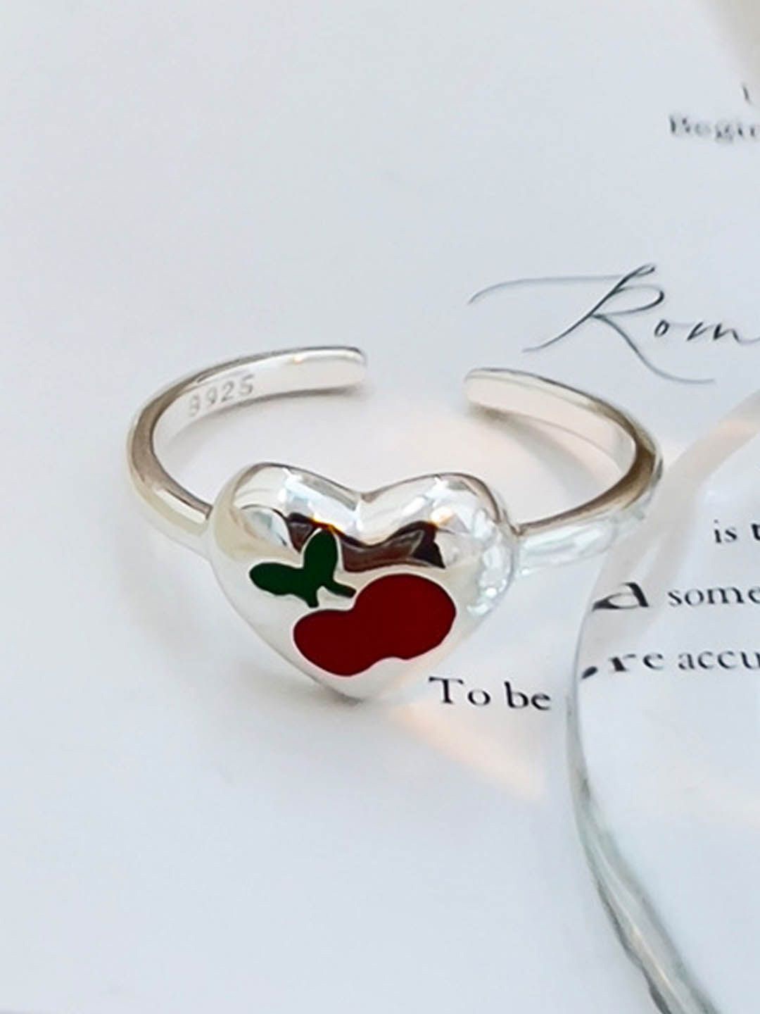 

StyleCast Silver-Toned Heart Shaped Adjustable Finger Ring