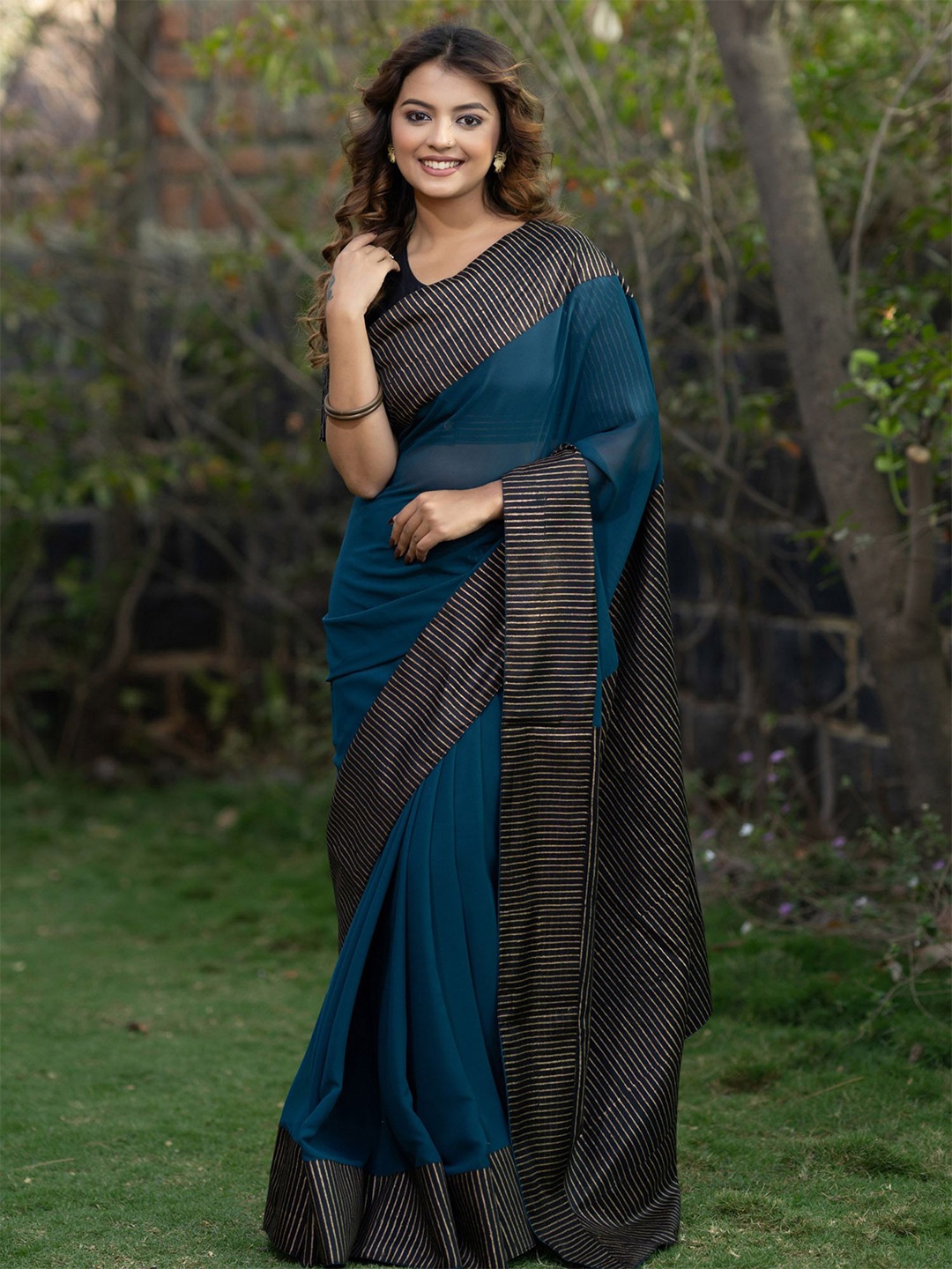 

Prasam Pure Georgette Striped Border Saree, Teal