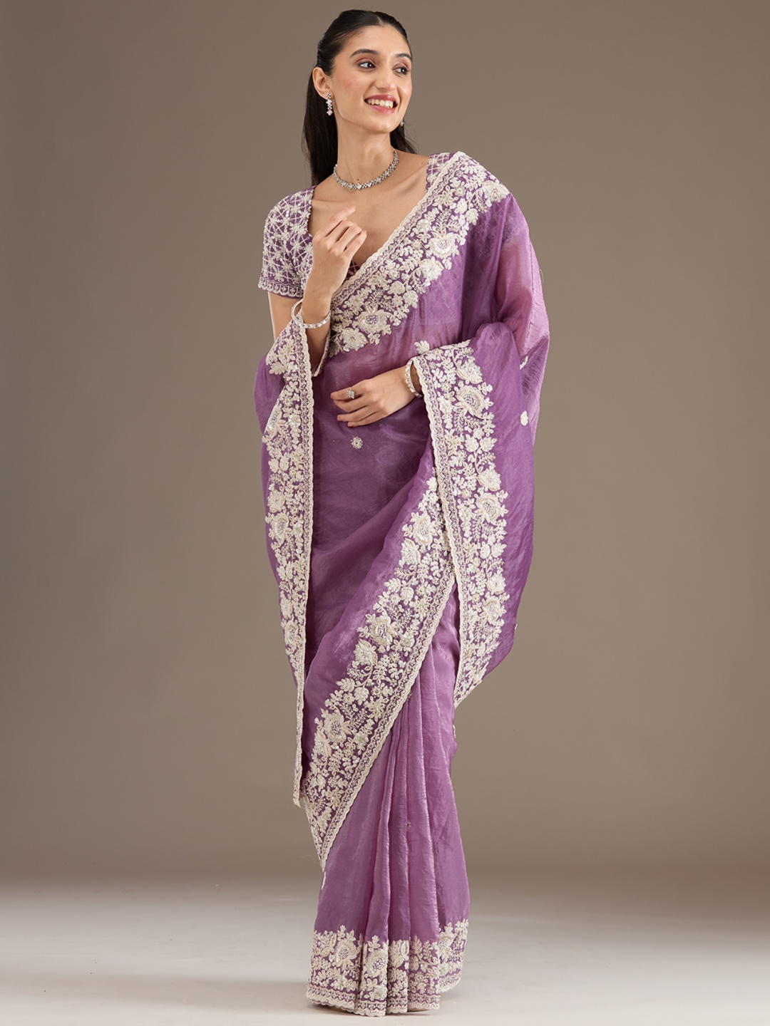 

Koskii Heavy Work Purple Embellished Tissue Saree