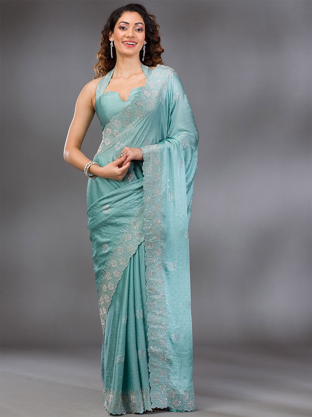 

Koskii Sea Green Swarovski Satin Saree