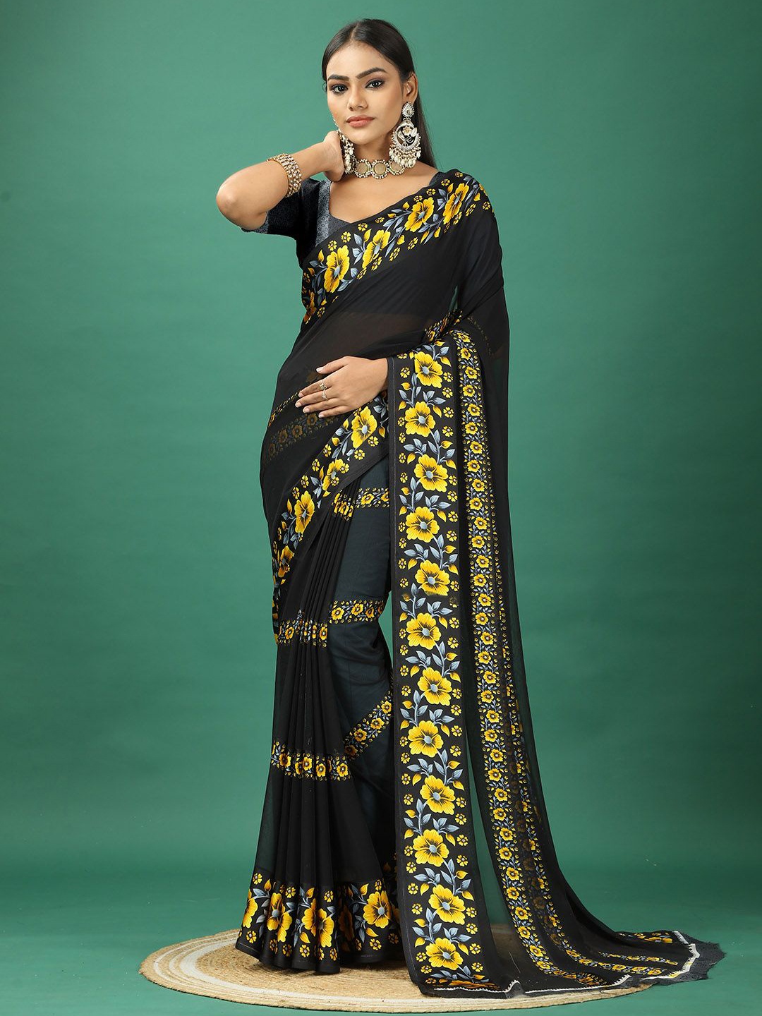 

A.V.M. SILK MILLS Floral Pure Georgette Saree, Mustard
