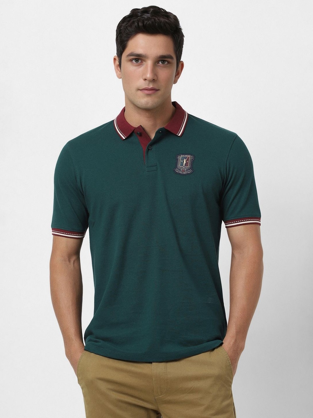 

Peter England Casuals Men Solid Polo Collar Cotton T-shirt, Green