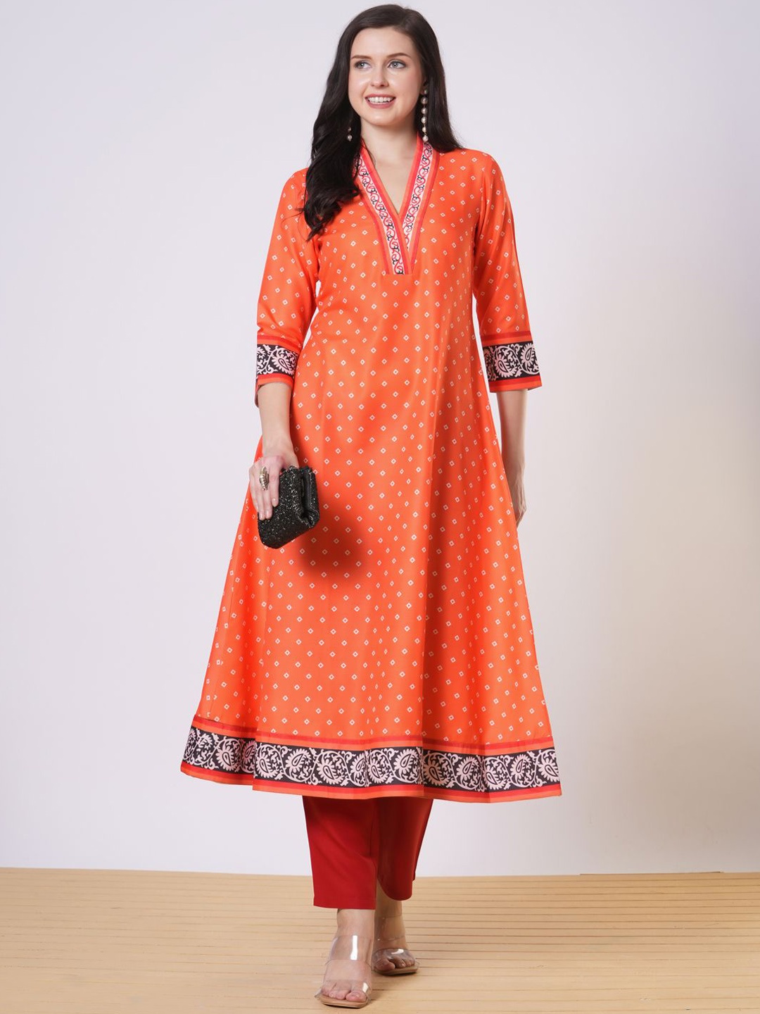 

GoSriKi Bandhani Printed V-Neck A-Line Kurta With Palazzos, Orange