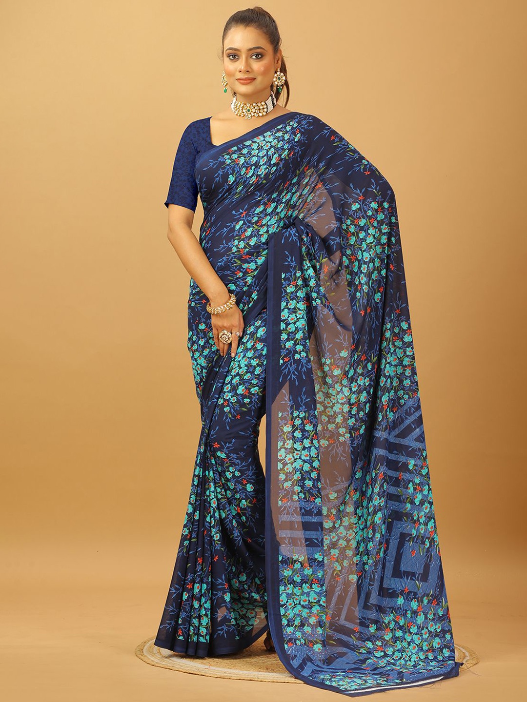 

A.V.M. SILK MILLS Floral Printed Pure Georgette Saree, Blue