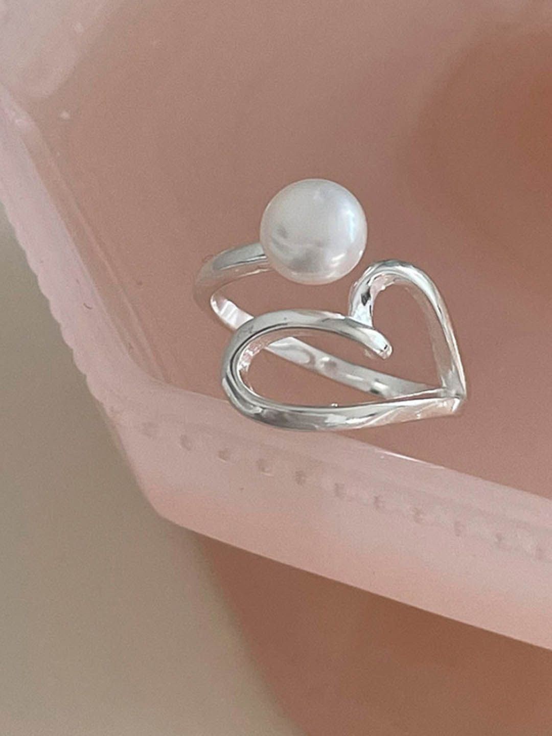 

StyleCast Elegant Silver-Toned Silver-Plated Pearls Studded Heart Shaped Finger Ring