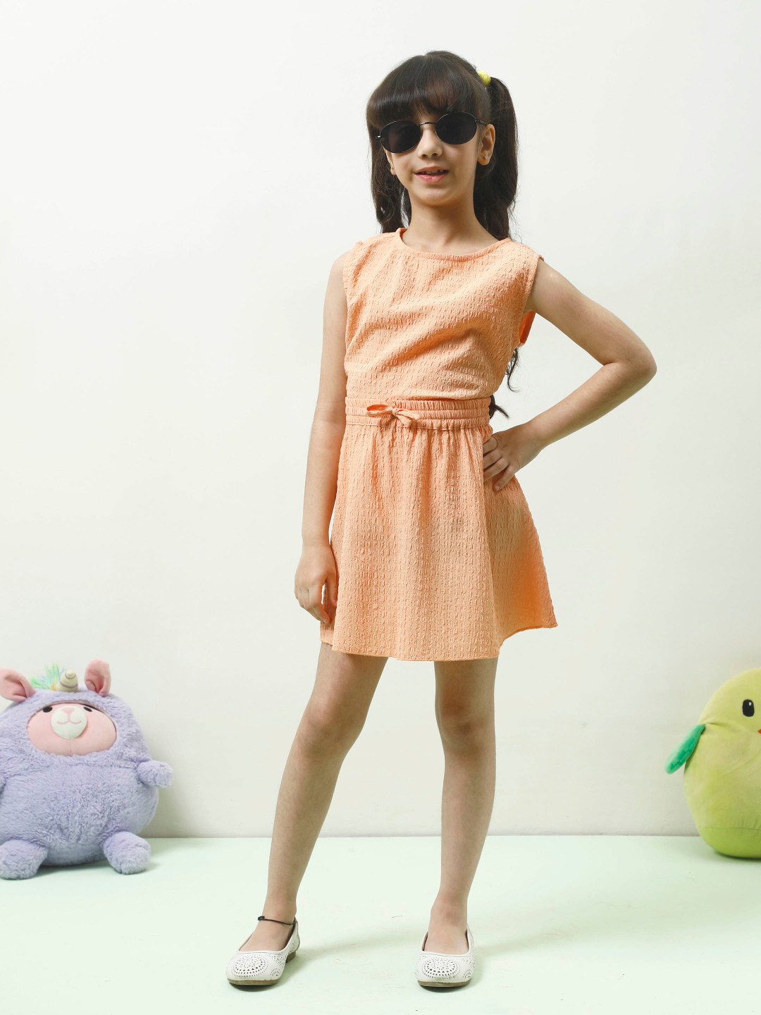 

Athena Girls Self Design Round Neck Top With Skirt, Peach