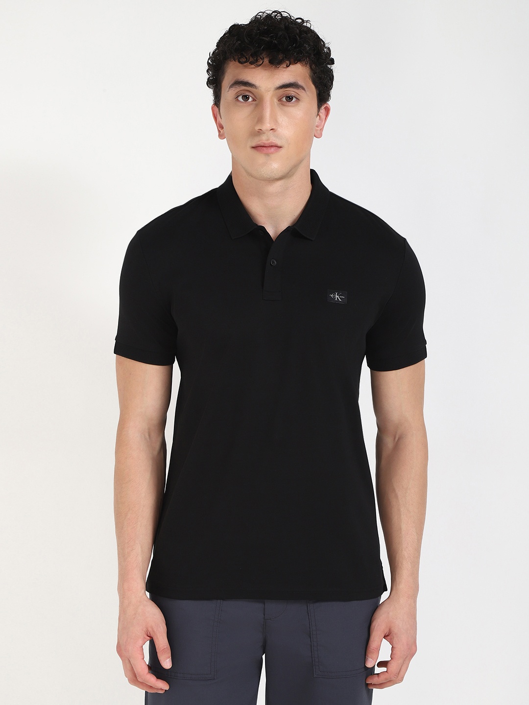 

Calvin Klein Men Solid Polo Collar Cotton T-shirt, Black