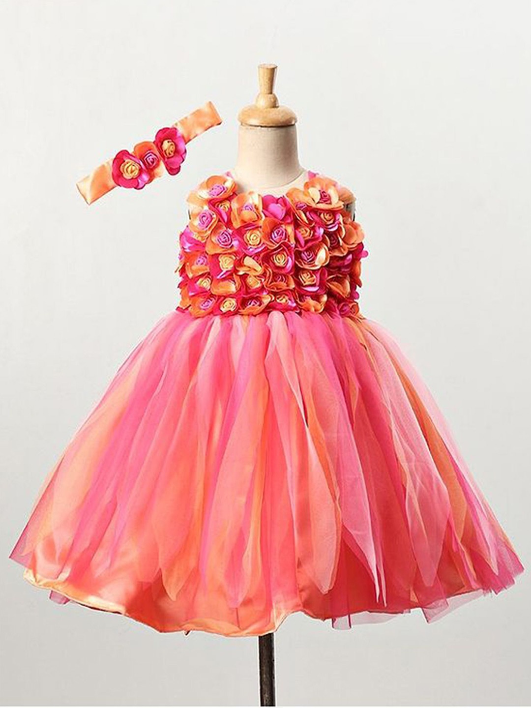 

Li & Li Boutique Girls Pink and Peach Flower Frock With Multi stripes