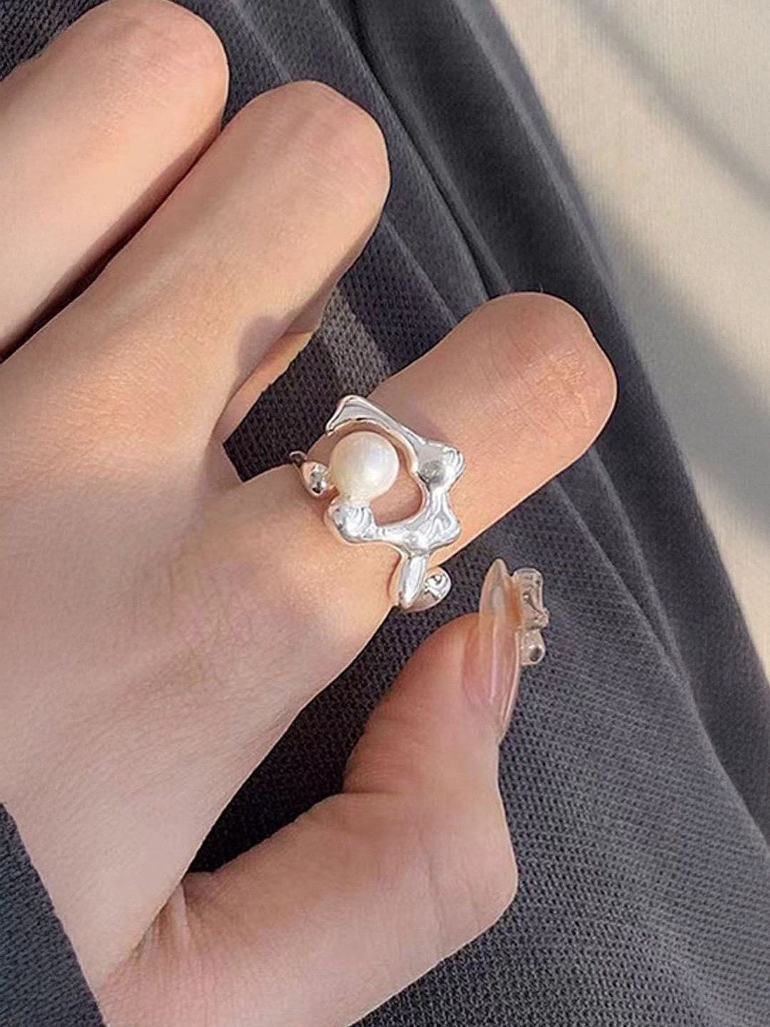 

StyleCast Silver-Plated Artificial Stone Studded Finger Ring