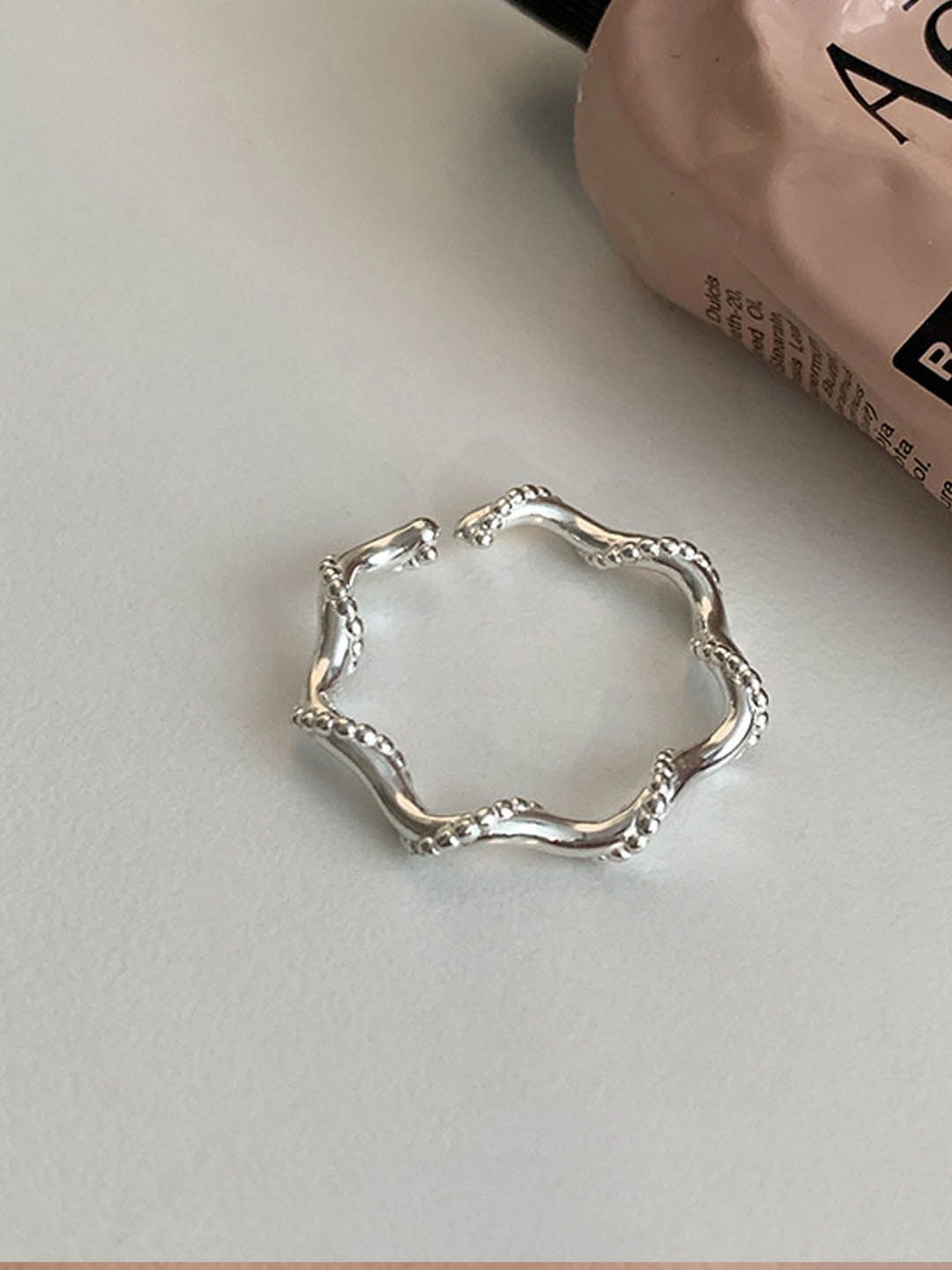 

StyleCast Elegant Silver-Toned Intricate Textured Round Shaped Open Finger Ring