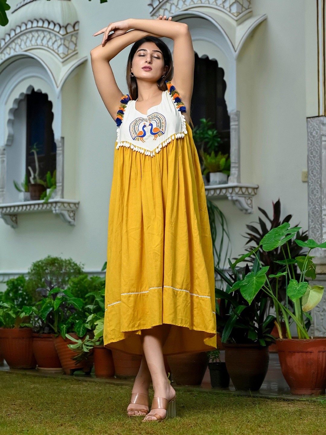 

Rashmi Shree Creation Women Embroidered Cotton Fit & Flare Midi Dress, Yellow