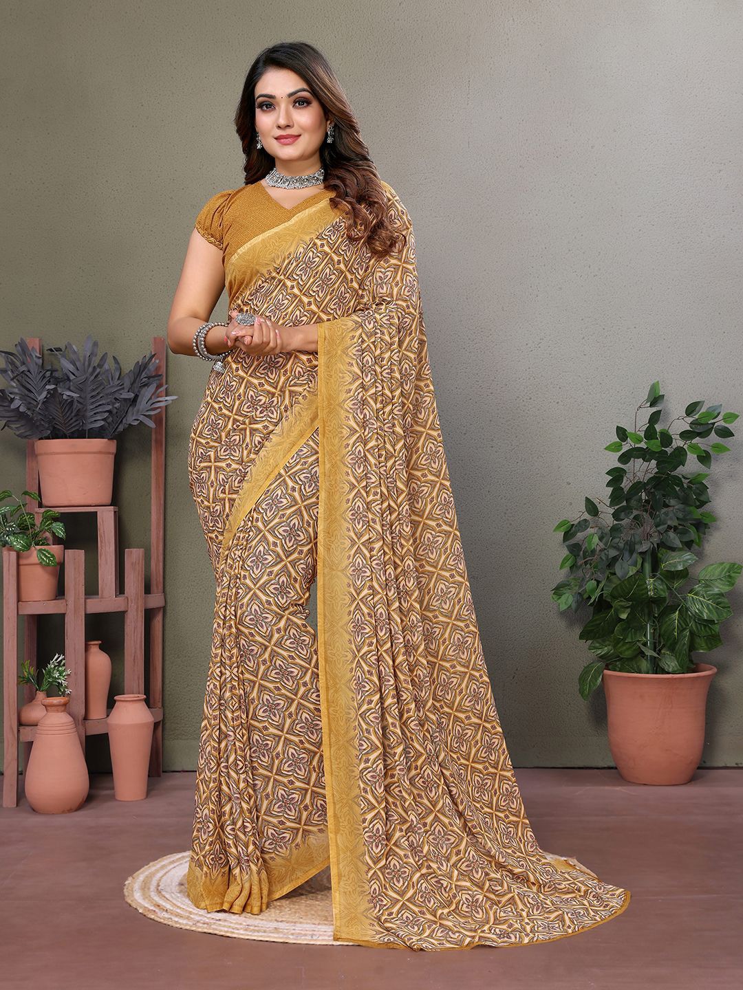 

Moda Rapido Ethnic Motifs Saree, Yellow