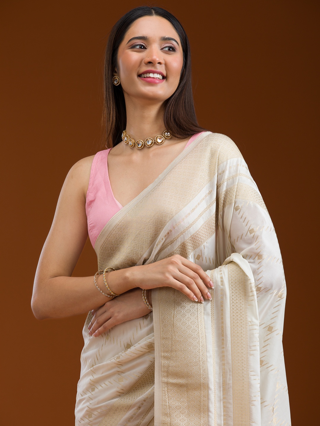 

Koskii Woven Design Zari Cream Embellished Georgette Saree, White