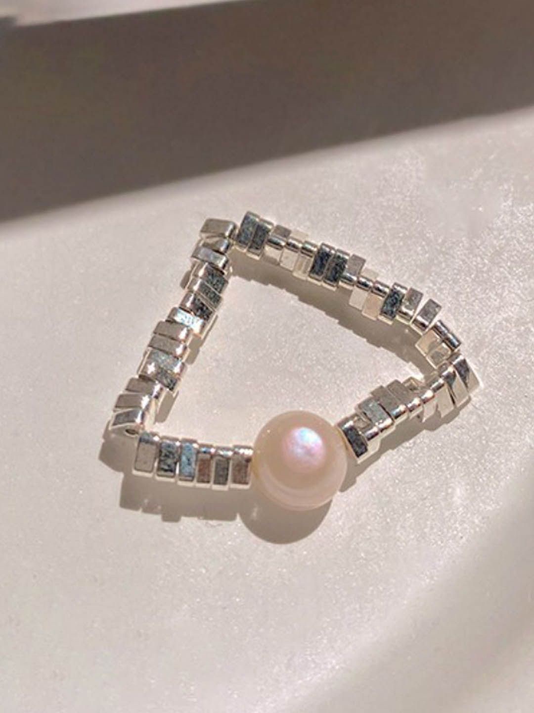 

StyleCast Elegant Silver-Toned Artificial Beaded Finger Ring