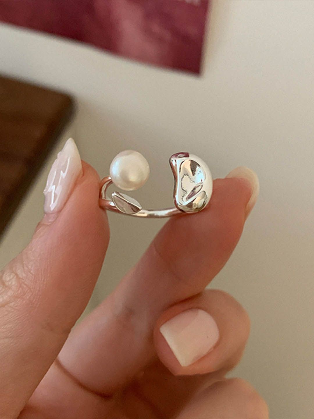 

StyleCast Elegant Silver-Toned Pearls Adjustable Finger Ring