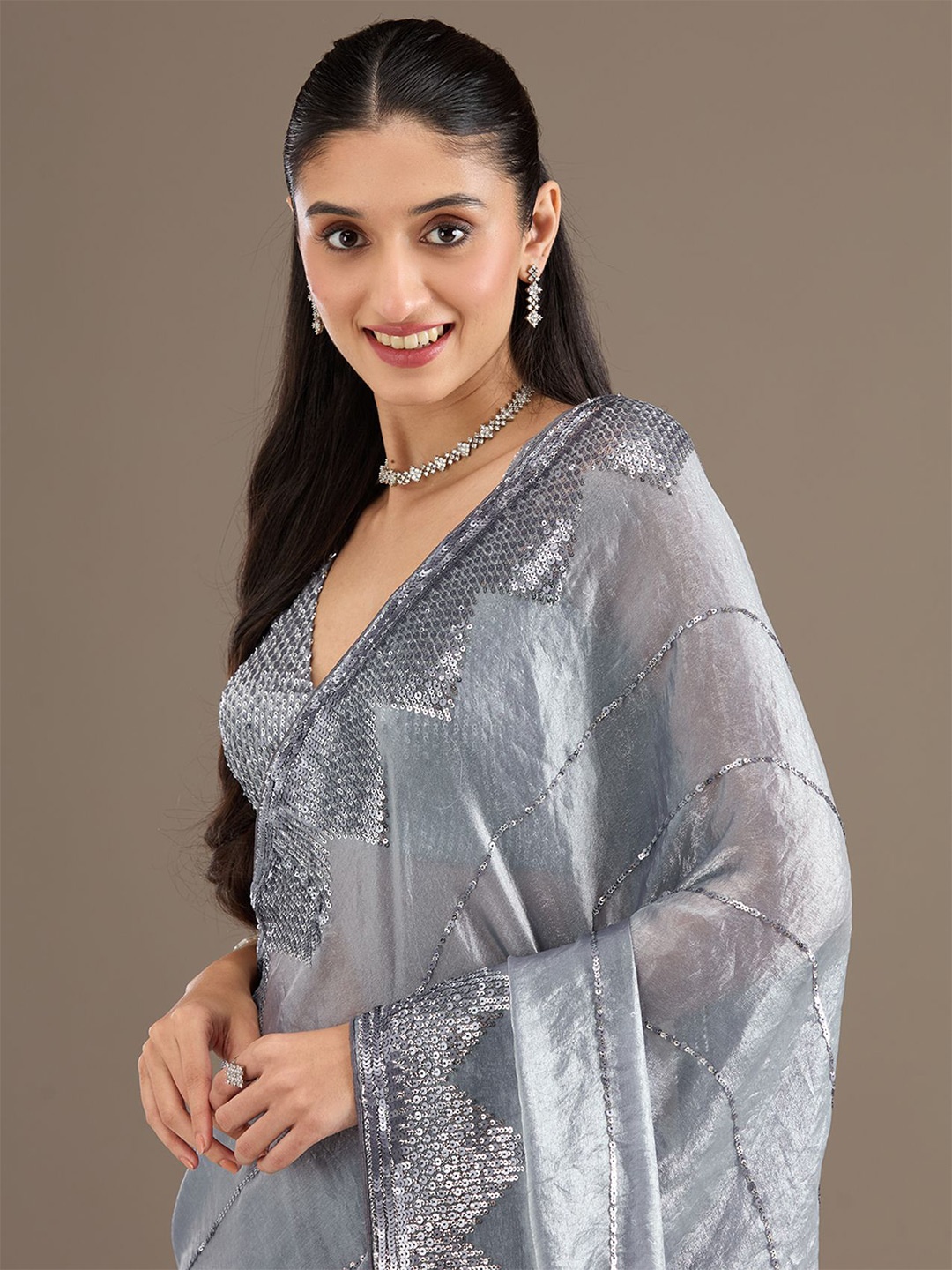 

Koskii Grey Embellished Tissue Saree