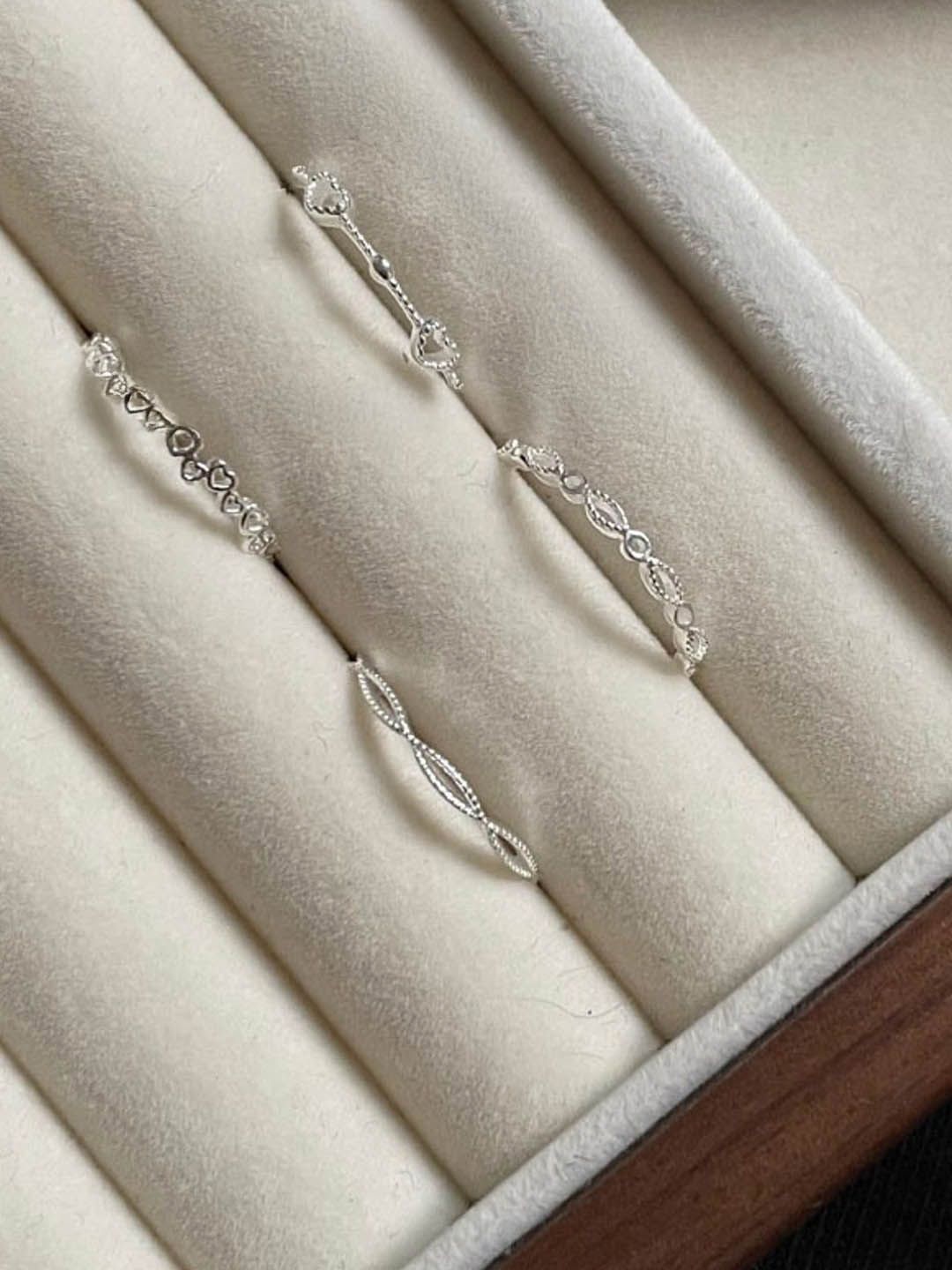 

StyleCast Elegant Silver-Toned Set Of 4 Intricate Textured Finger Rings