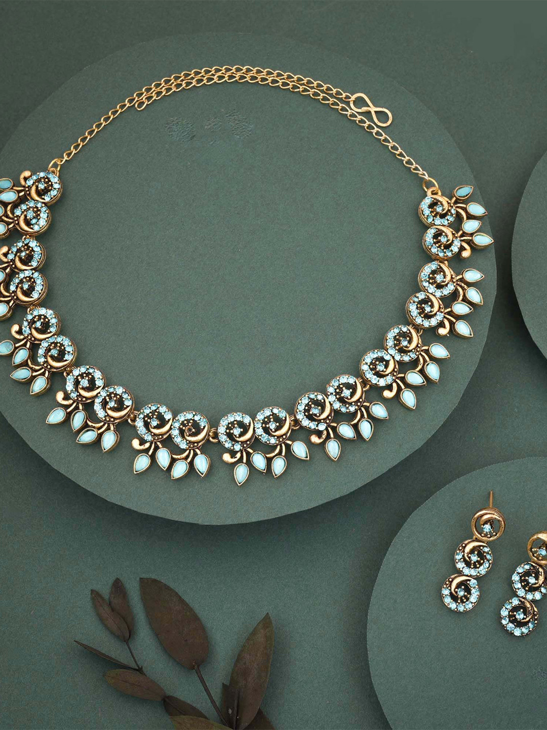 

Lyriss Gold-Plated American Diamond Stone-Studded Necklace & Earrings