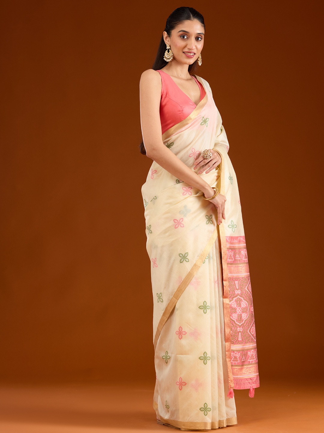 

Koskii Cream Embellished Tissue Saree