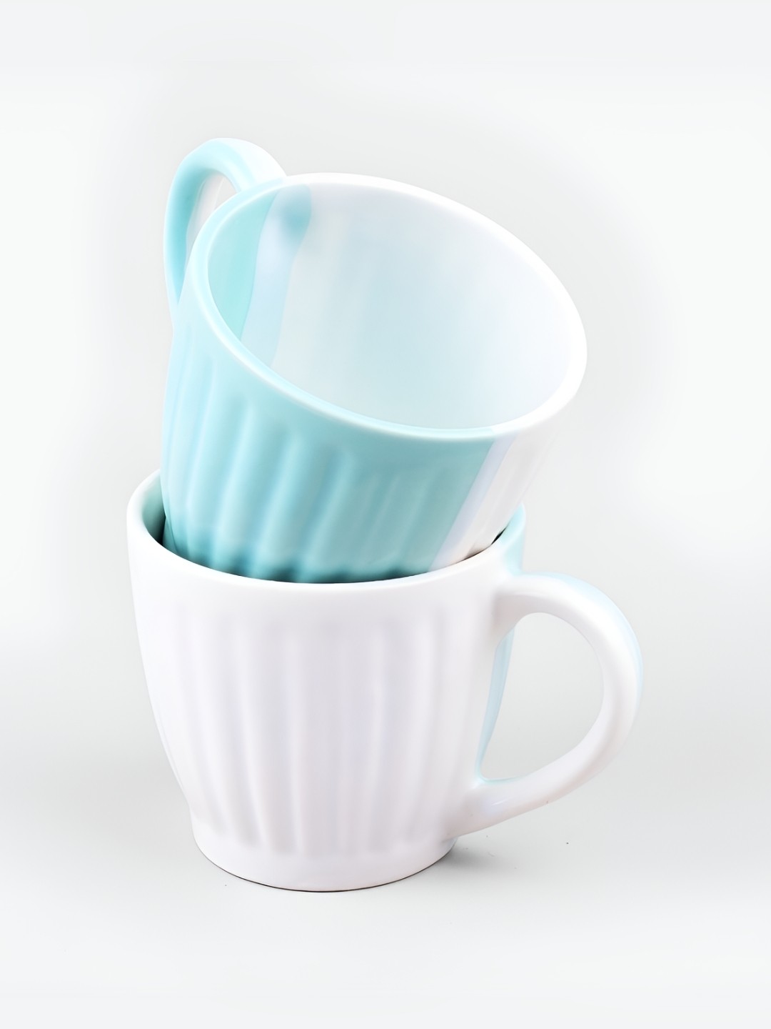 

Storepedia White & Blue Handcrafted Textured Ceramic Glossy Cups Set of Cups and Mugs