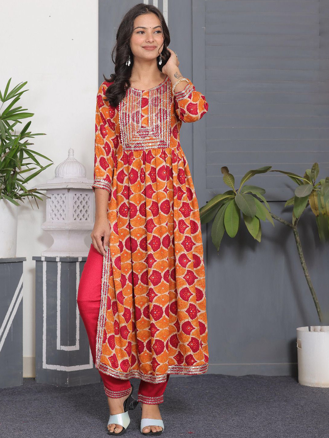 

KALINI Ethnic Motifs Printed Pleated Sequinned A-Line Kurta With Trousers & Dupatta, Orange