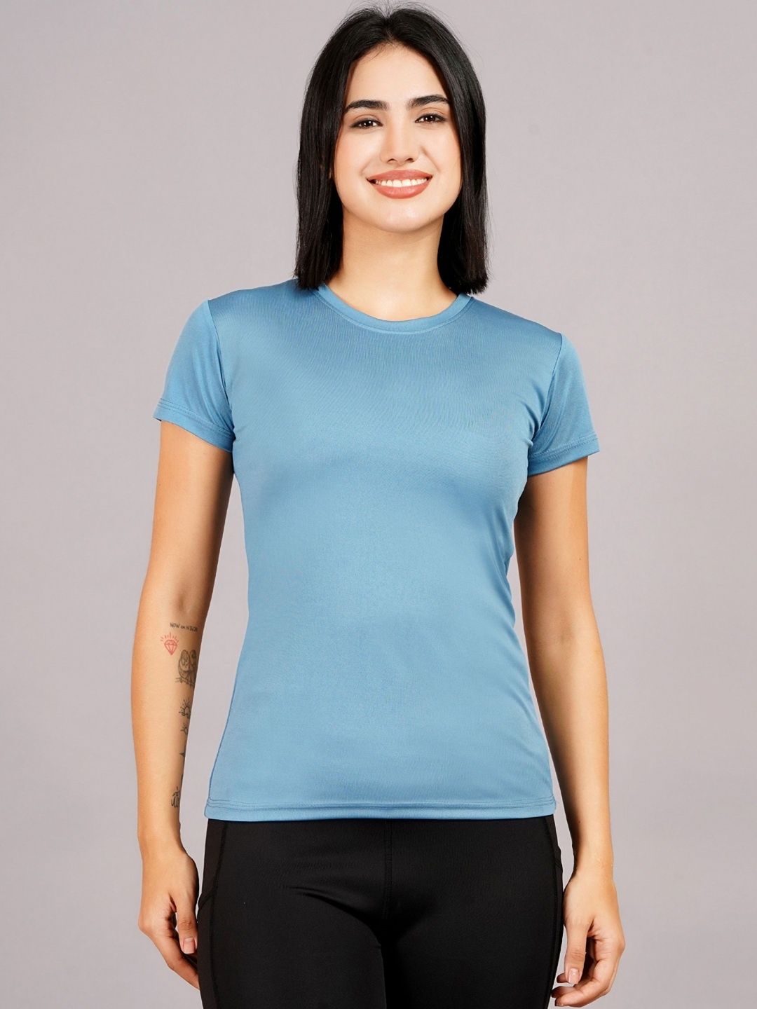 

Kyk Women Solid Round Neck Compression T-shirt, Blue
