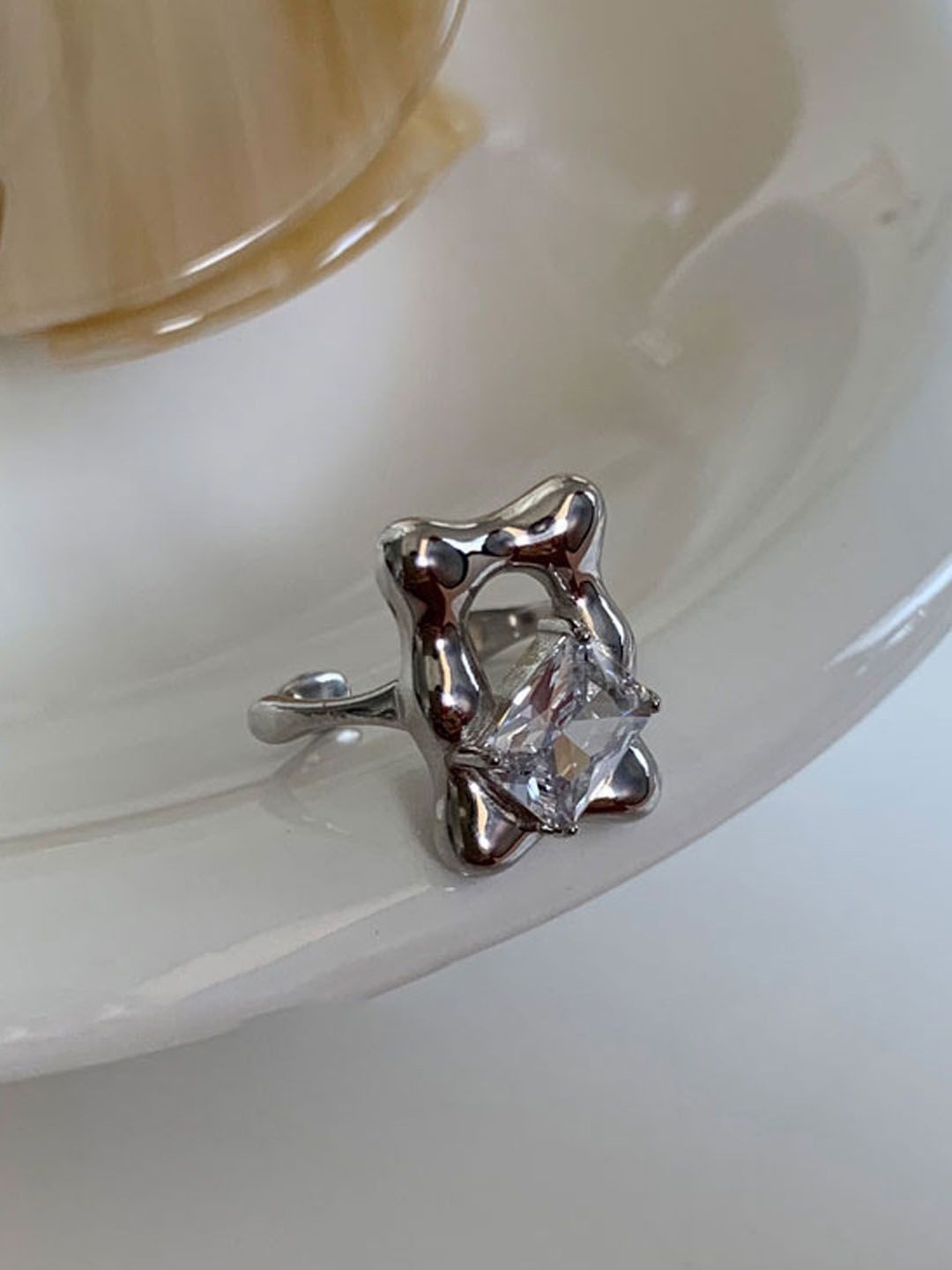 

StyleCast Elegant Silver-Plated Artificial Stones Studded Adjustable Finger Ring