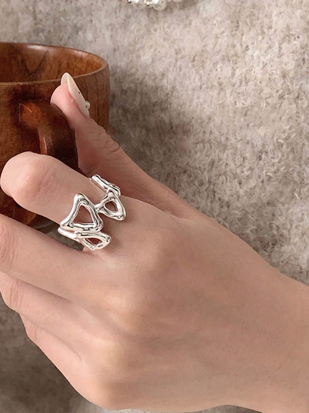 

StyleCast Silver-Toned Intricate Textured Geometric Shaped Adjustable Finger Ring