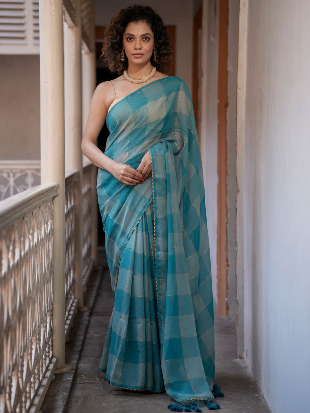 

Suta Teal Color Cotton Zari Saree