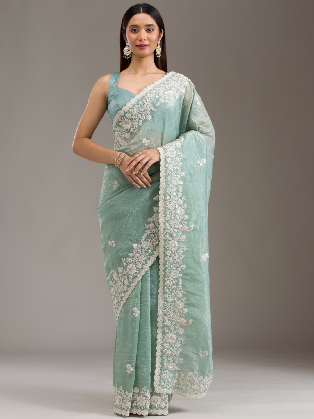 

Koskii Green Embellished Tissue Saree